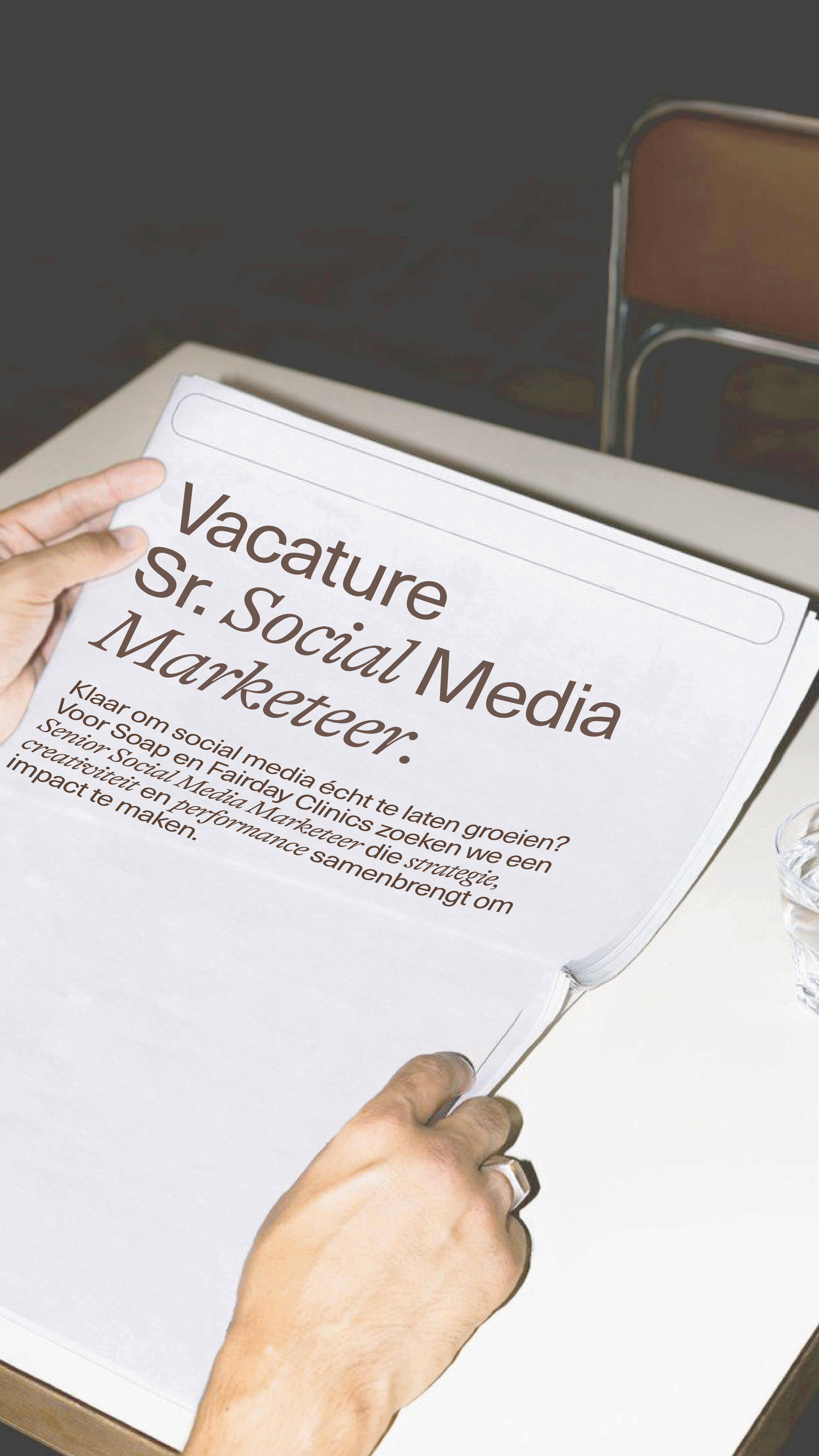 A newspaper with a vacany text